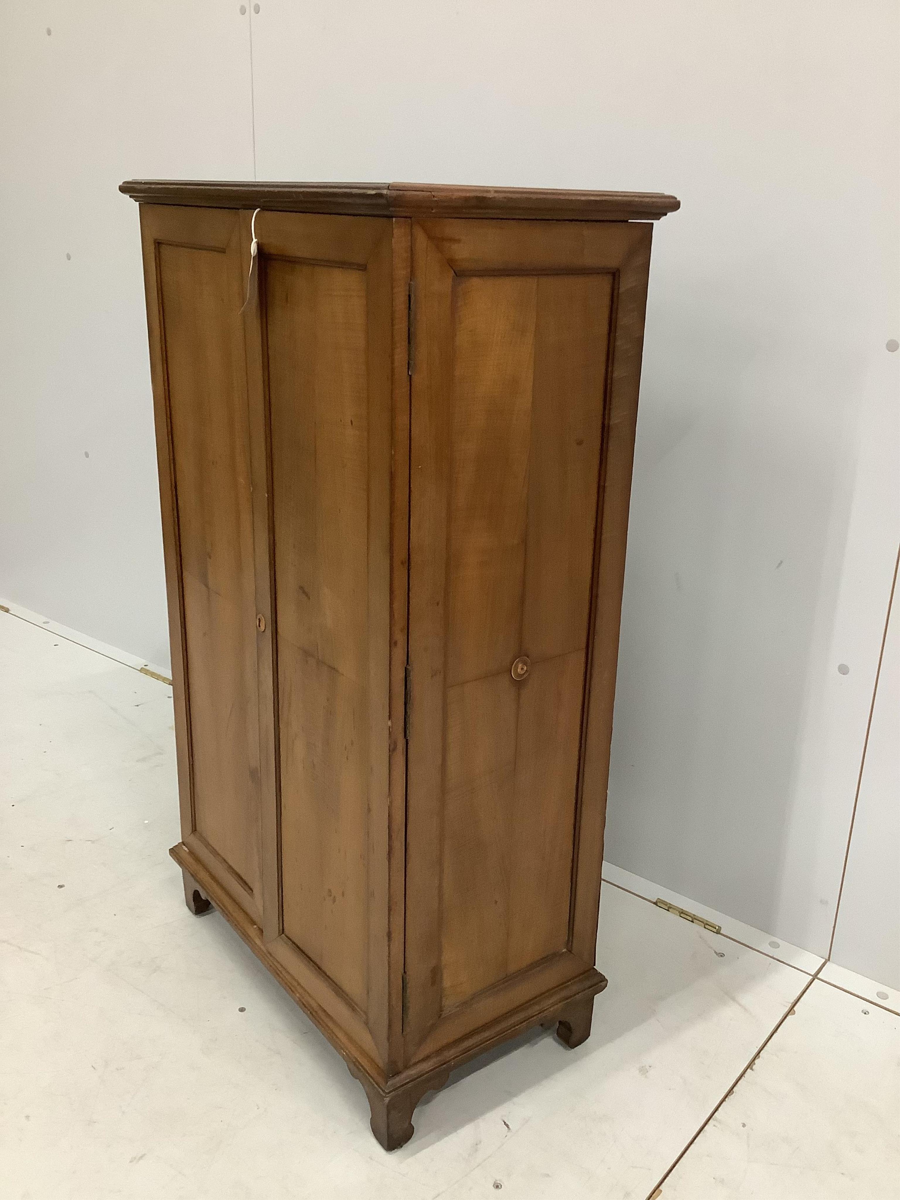 An early 20th century walnut office cabinet fitted with nine deep drawers, width 61cm, height 106cm. Condition - fair, a little faded